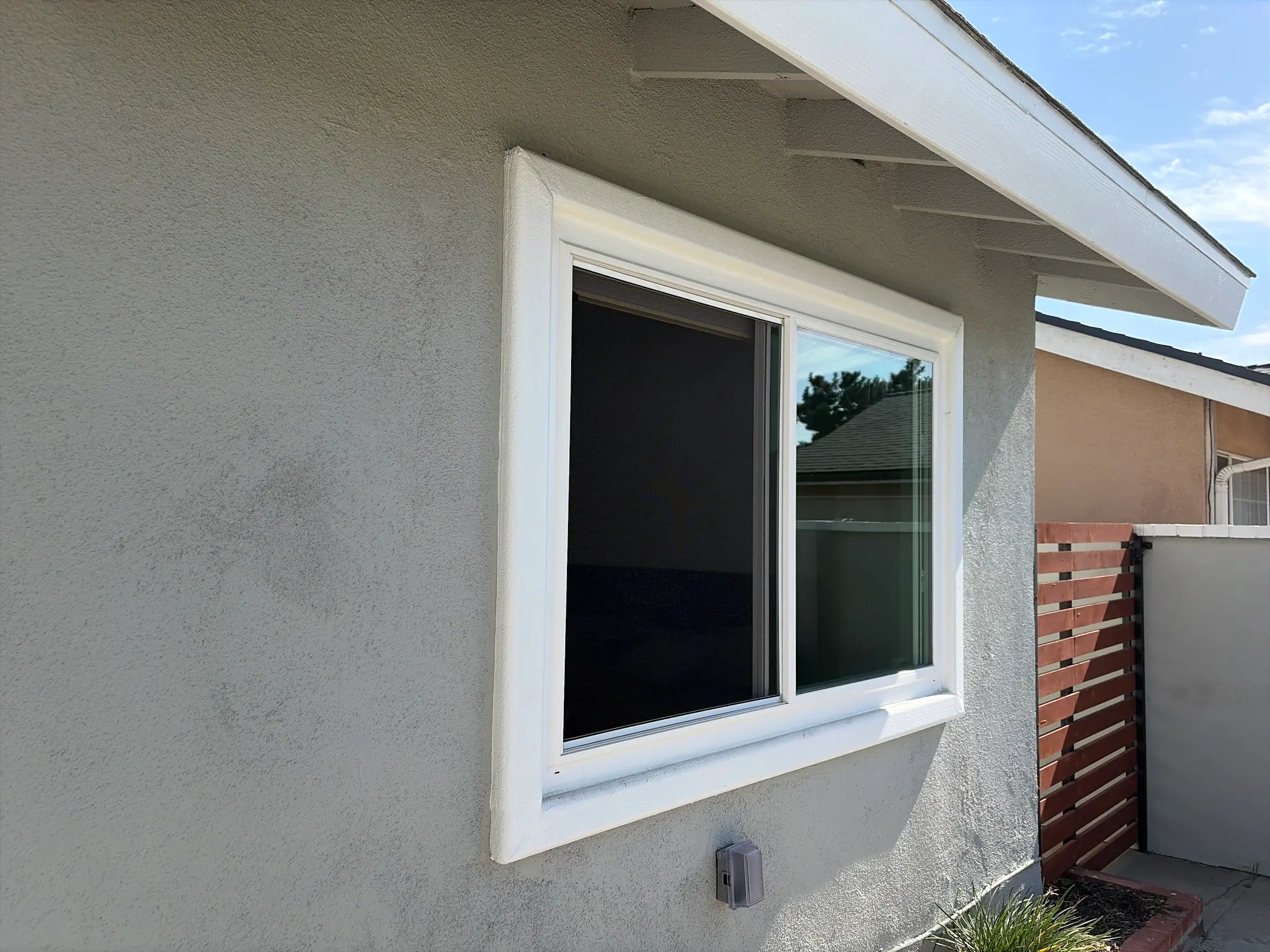Home windows fitted with dark solar screens
